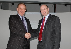 In January, Russell J. Searle (l), chapter president, welcomes guest speaker Steve Hyde, head of the Systems Engineering and Integration Group, Defense Equipment and Support, Ministry of Defence.